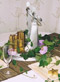 Little Ironies figurine with candle arrangement from Waow Studio