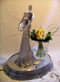 Little Ironies figurine with spring arrangement